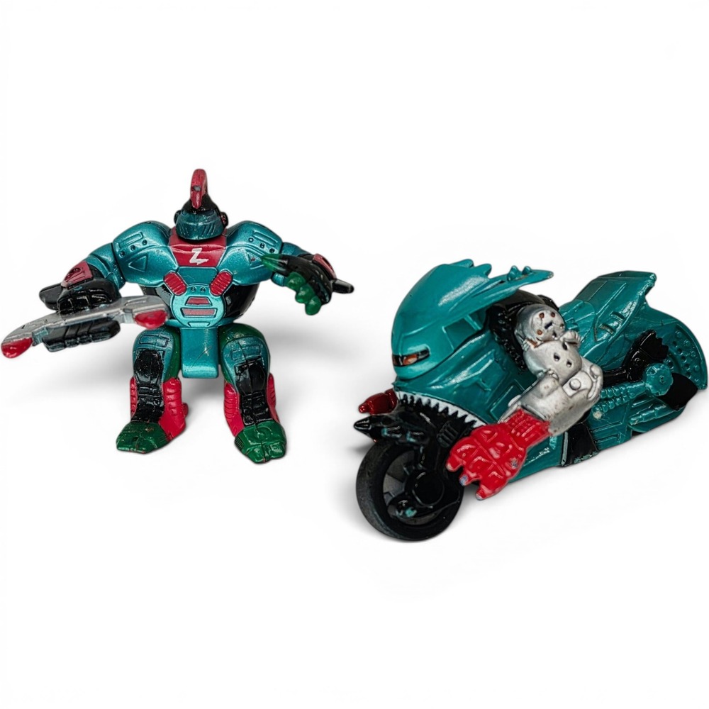 1994 Galoob Micro Machines Z-Bots Revbots Cyclaw with D-Fender Figure Set Teal